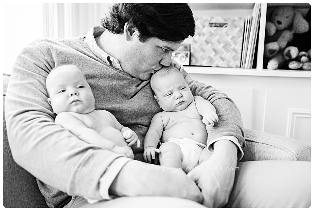 father and twin newborns at home photo session boston