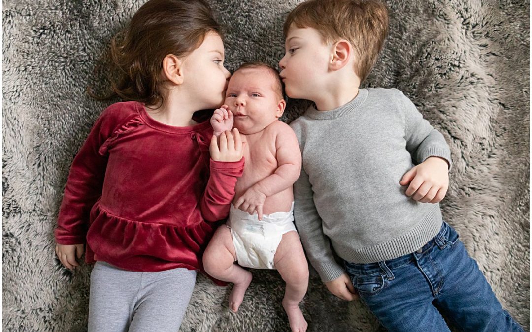 Twin Siblings (and their parents) Welcome Baby Frankie