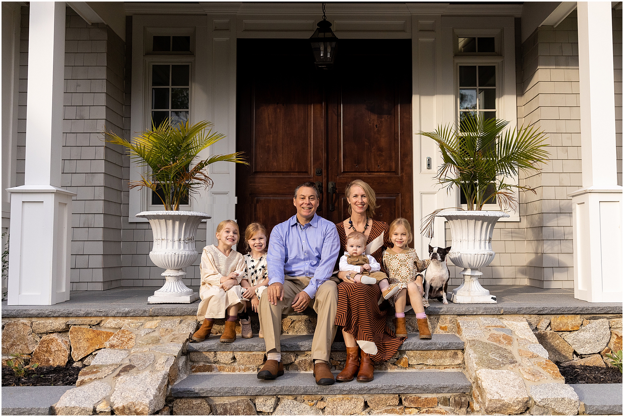 front steps project creator takes boston fall family photo
